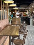 Made Market Food Court Seating towards Amphora Wine Bar - Hamilton East