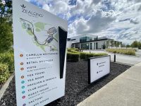 Zealong Tea Estate Sign with Building Background
